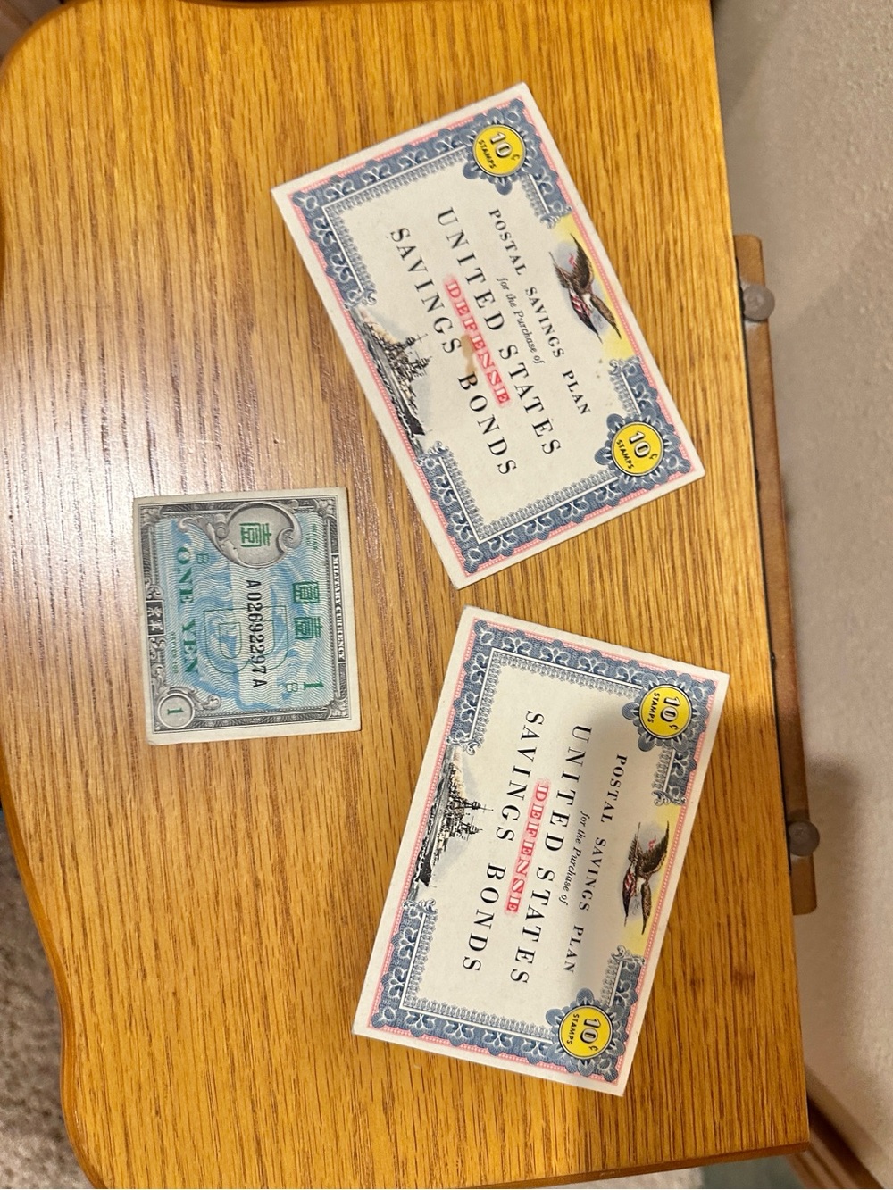 Vintage United States Postal Savings Bonds and One Dollar Note